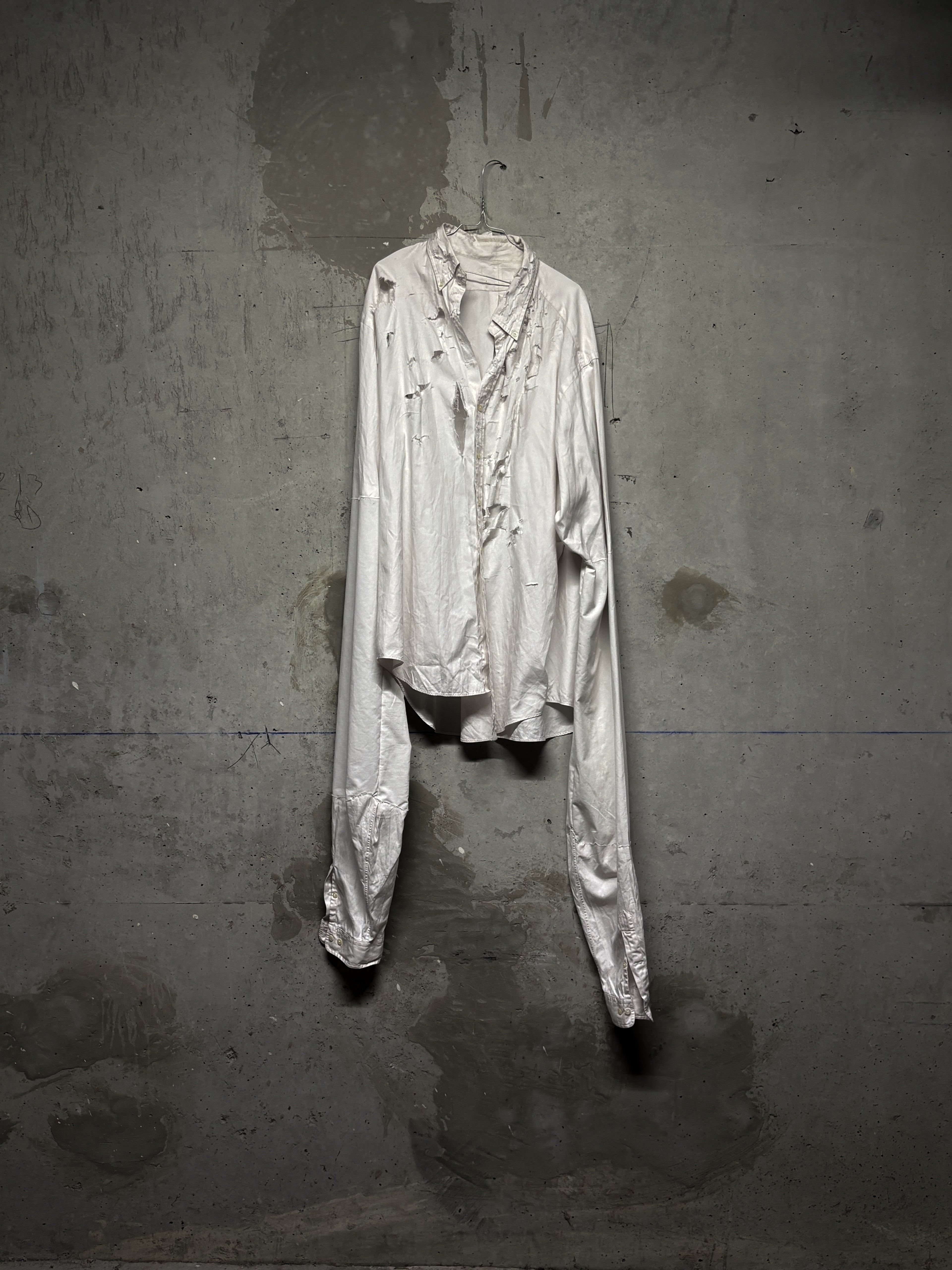 EVIDENCE ITEM: ASYMMETRIC DRAPE SHIRT
